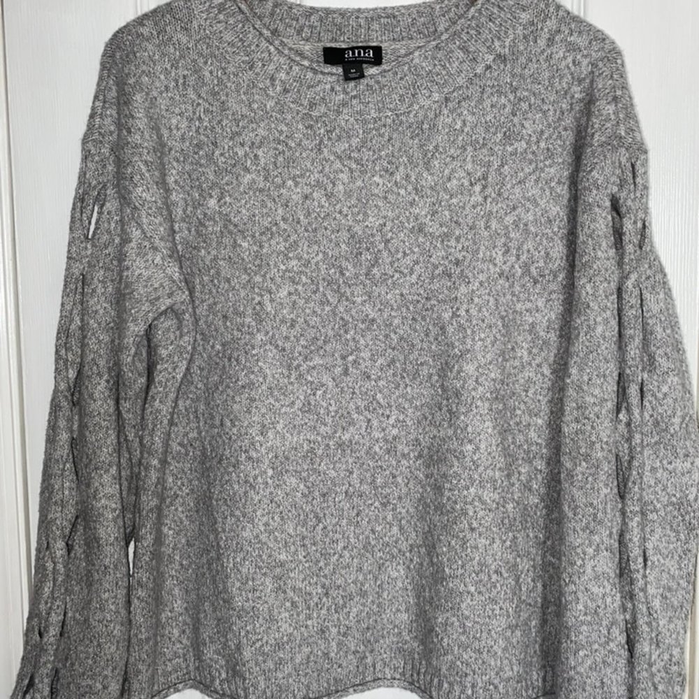 Long sleeve grey sweater with cutout sleeve detail